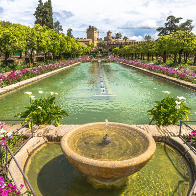 The popular gardens with fountains of Alcazar de los Reyes Cristianos, a medieval building and popular tourist attraction, located in the Andalusian city of Cordoba, Spain