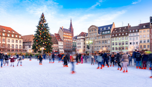Enchanting Travels France Tours Ice Skating near the Cathedral in Strasbourg
