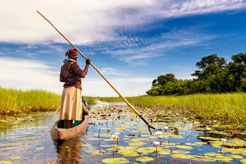 dugout-canoe-through-okavango-delta-botswana