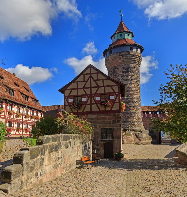 Nuremberg Castle (Sinwell tower) with blue sky and clouds, Germany Tours