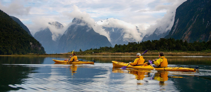 Enchanting Travels New Zealand Tours sea kayak in Milford Sound, New Zealand