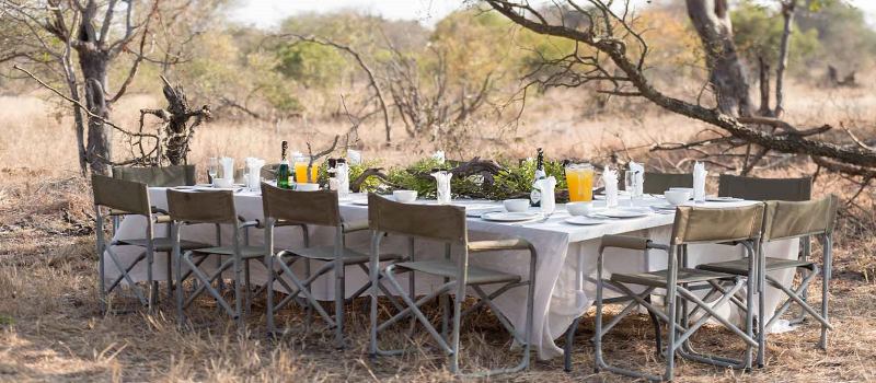 Outdoor dining at Africa on Foot Camp in Kruger Central, South Africa