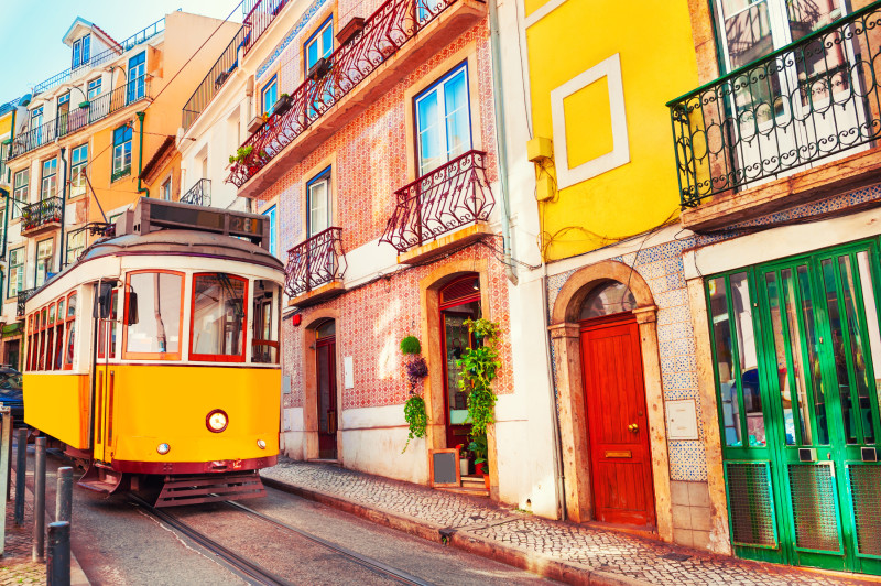 Yellow-vintage-tram-on-the-street-in-Lisbon-Portugal