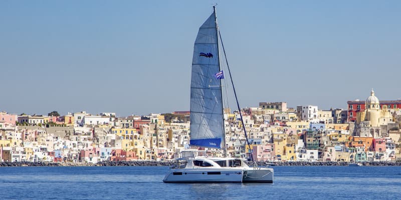 Sailing boat on the water in Procida, Italy