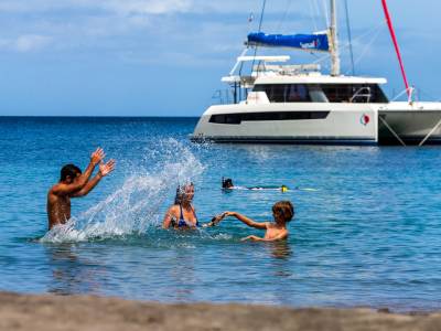 family splashing in the water