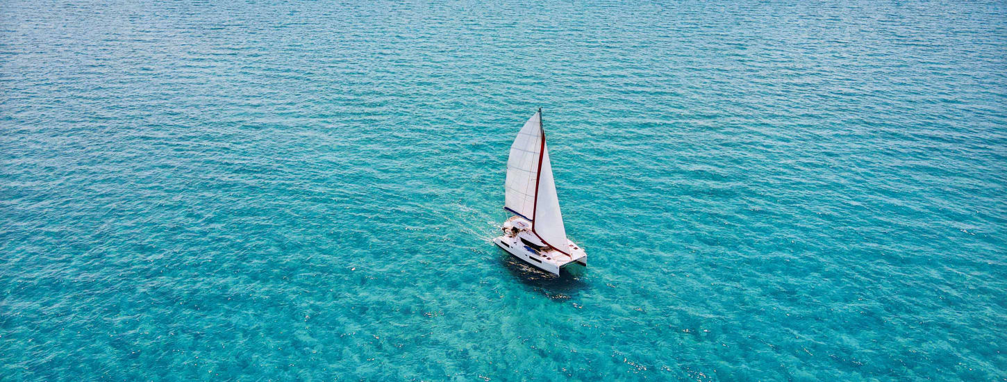 Sunsail catamaran sailing blue water