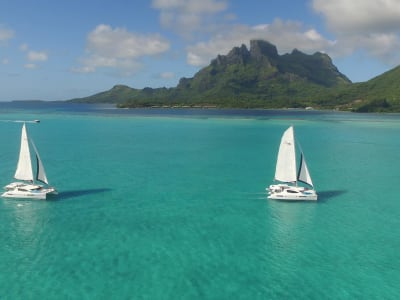 Two sailing catamarans in Tahiti