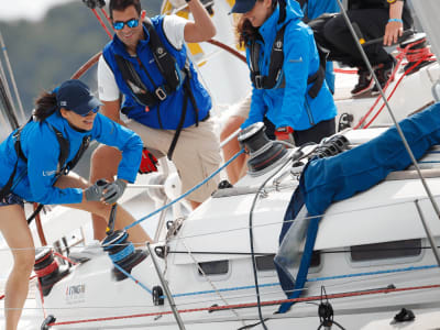 Sailors racing at Cowes Week