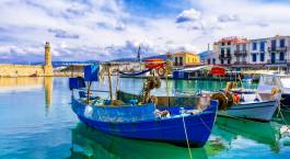 Enchanting Travels Greece Tours - Rethymnon with old lighthouse and fishing boats, Crete island