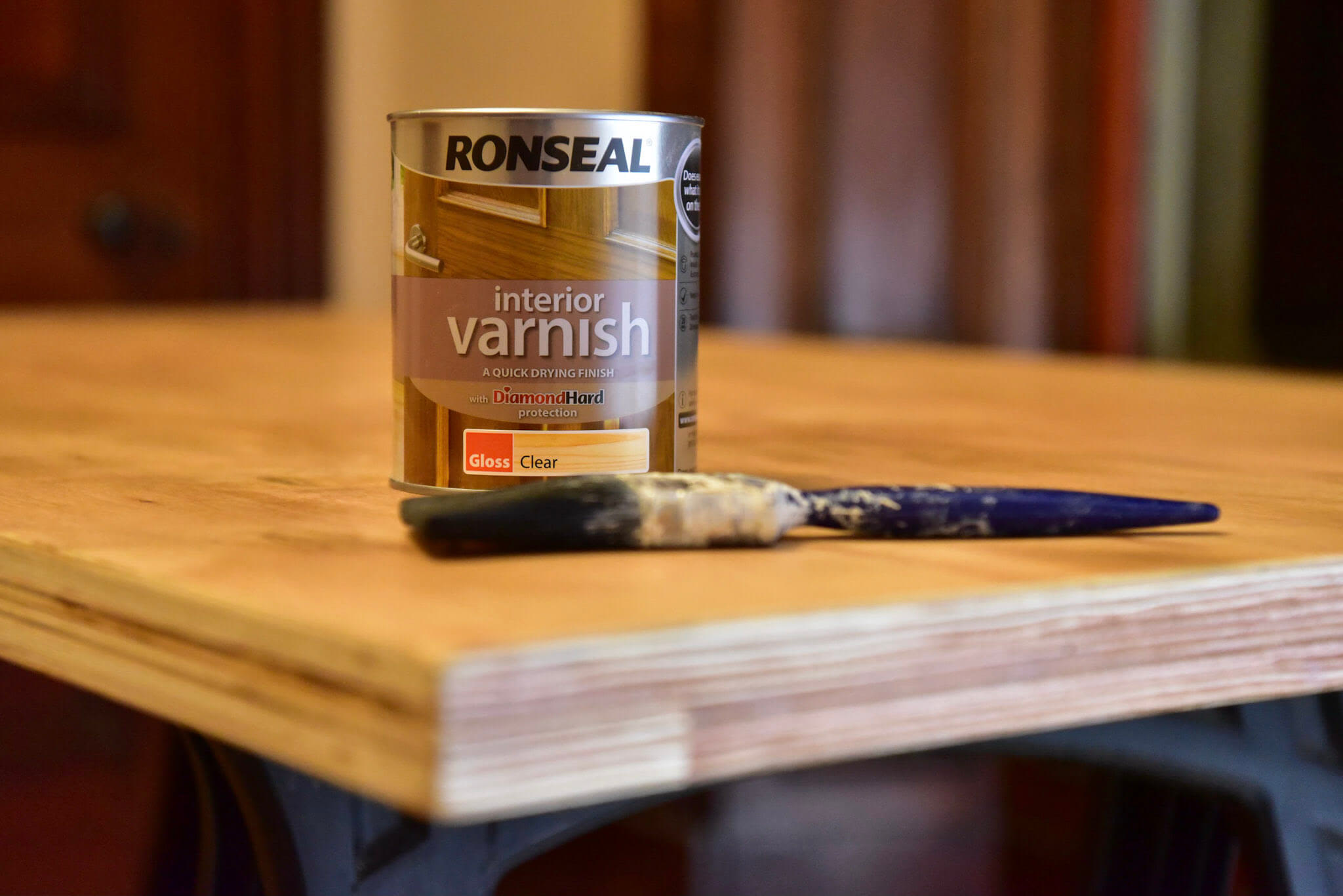 Several coats of varnish which applied to the desk top. Wire wool was used to burnish varnish between each coat.