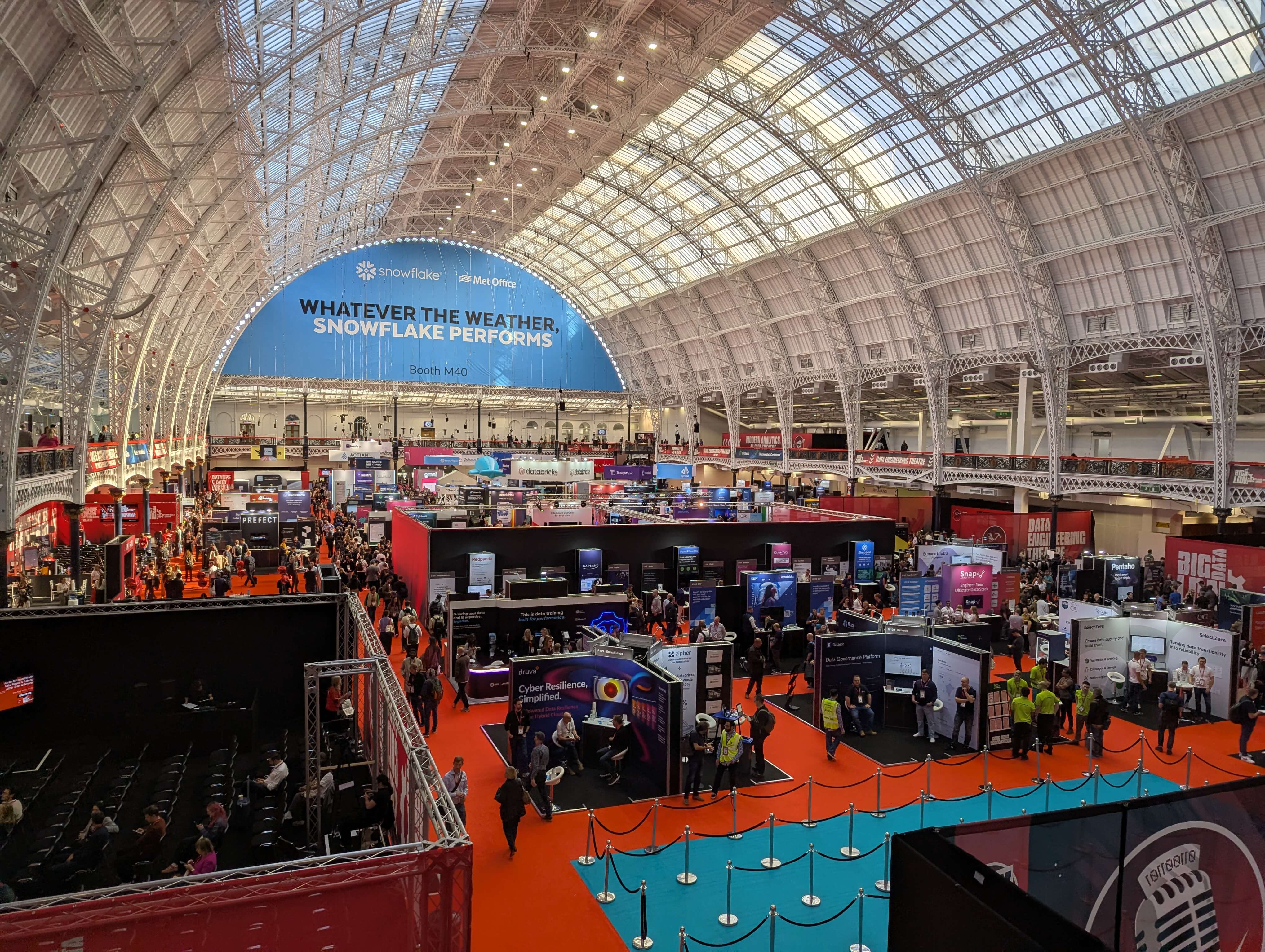 Photo of one of the two halls filled with exhibitors and theatres.