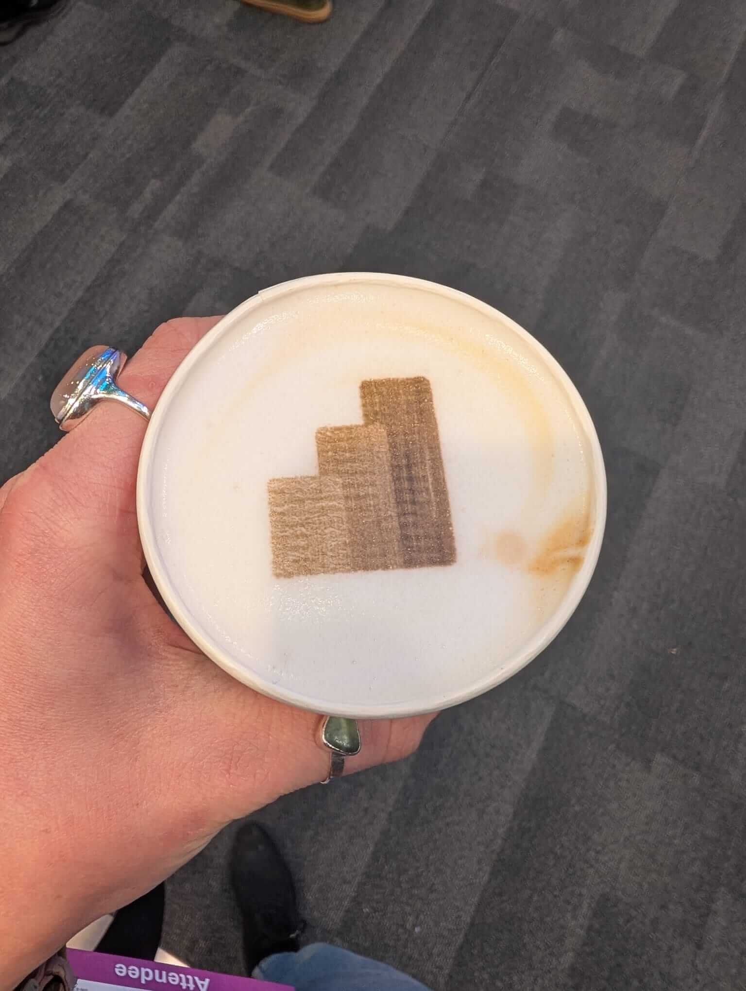 Power BI logo printed on coffee foam