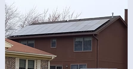 6.6kW all black roof mounted array installed on a Decra metal roof.