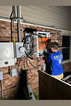 Team Member Installing a Battery, Teddy Wheeler