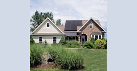 All-black Solaria solar panels on rustic home in Southwick, Massachusetts