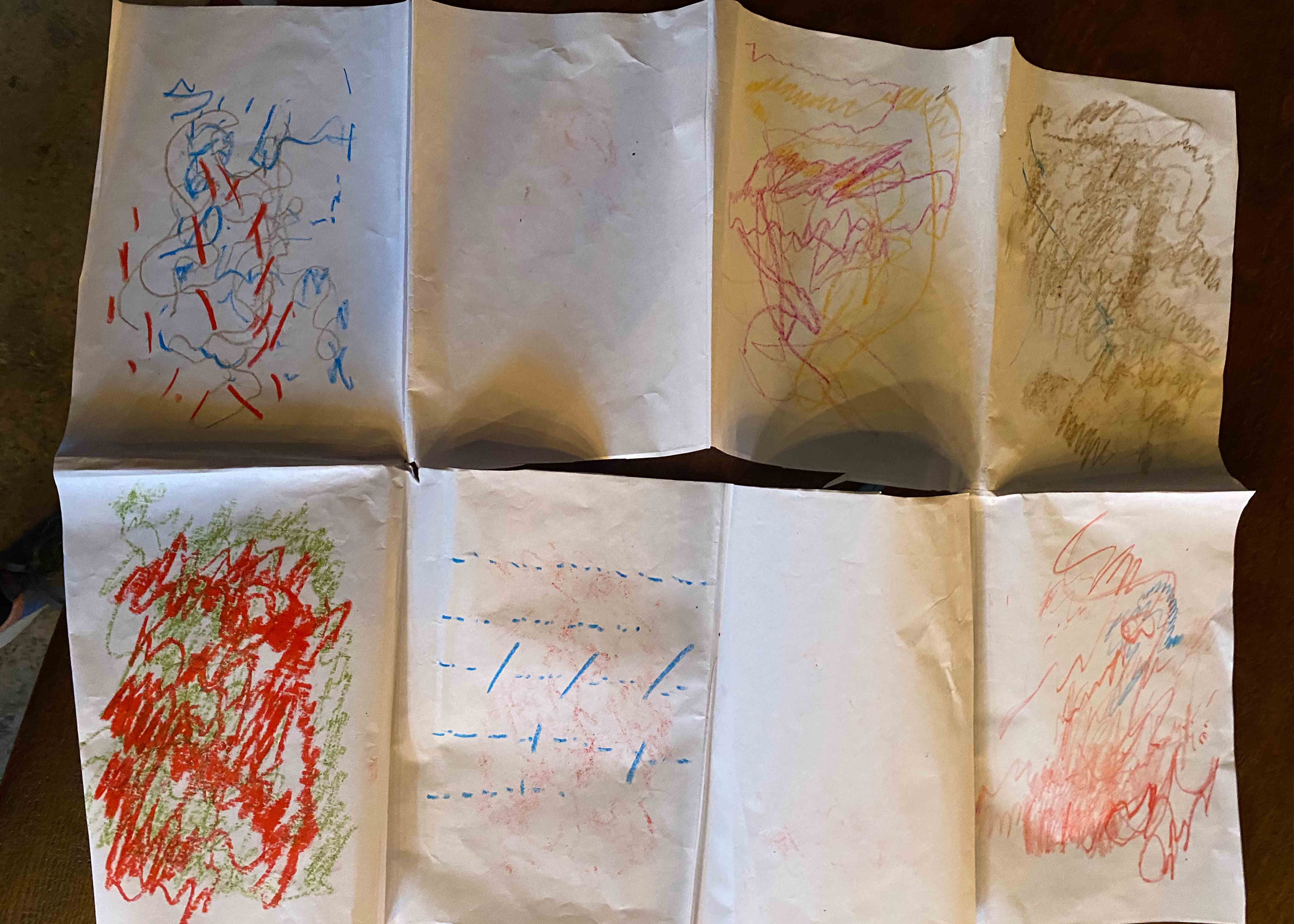 Drawings on a folded piece of paper