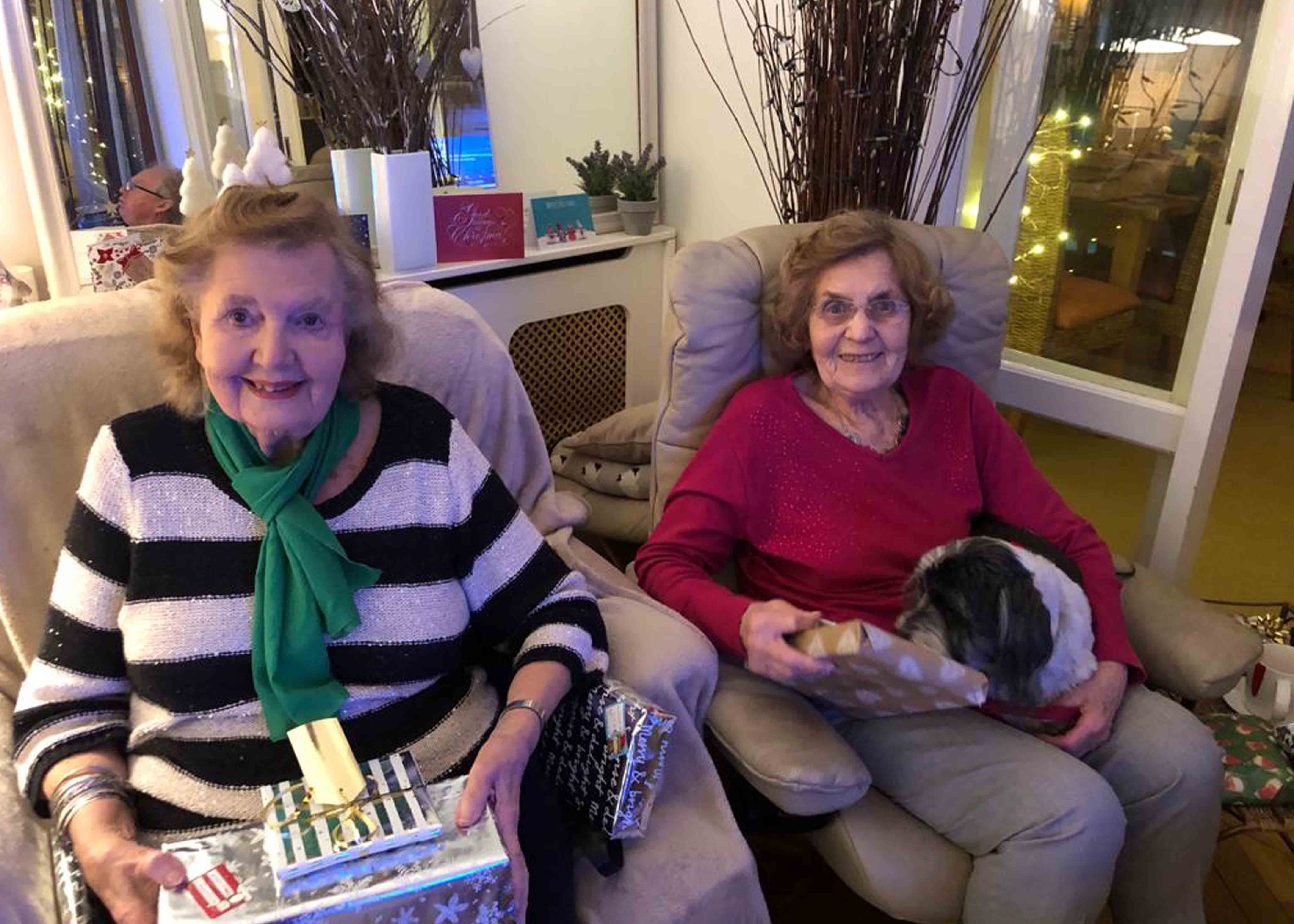 Two elderly women with presents