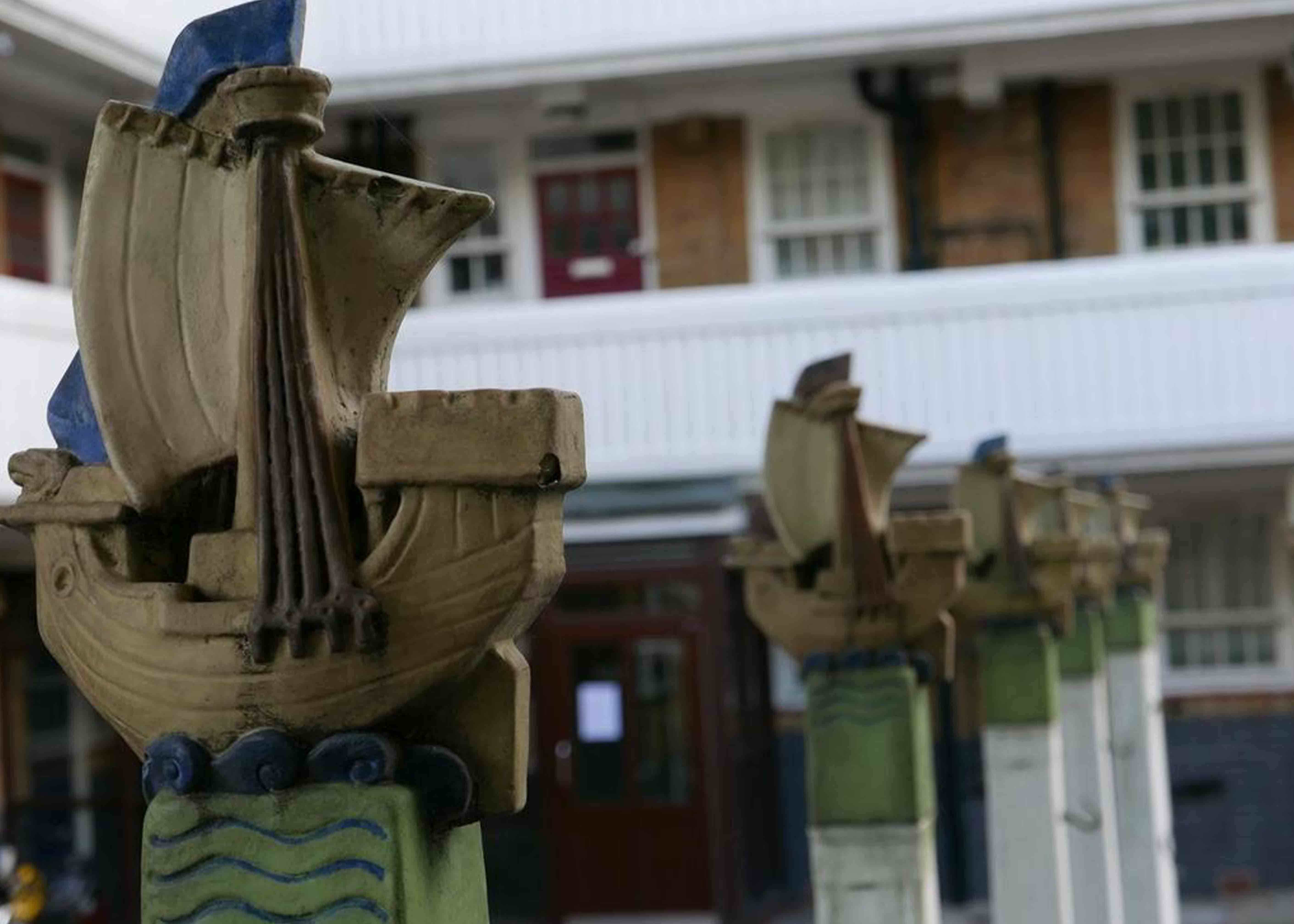 Scupltures of ships by the artist Gilbert Bayes