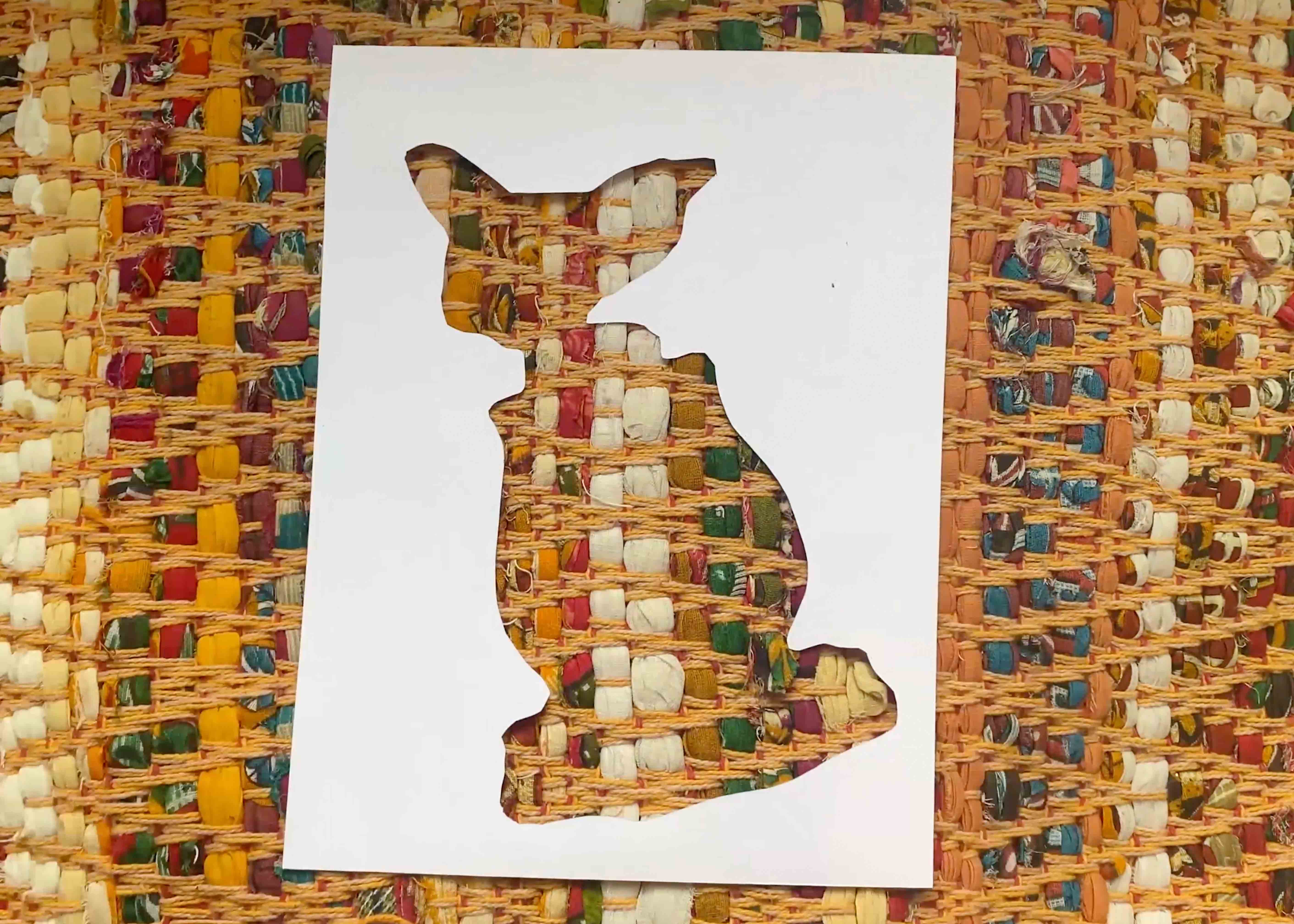 Stencil overlayed on a interesting pattern