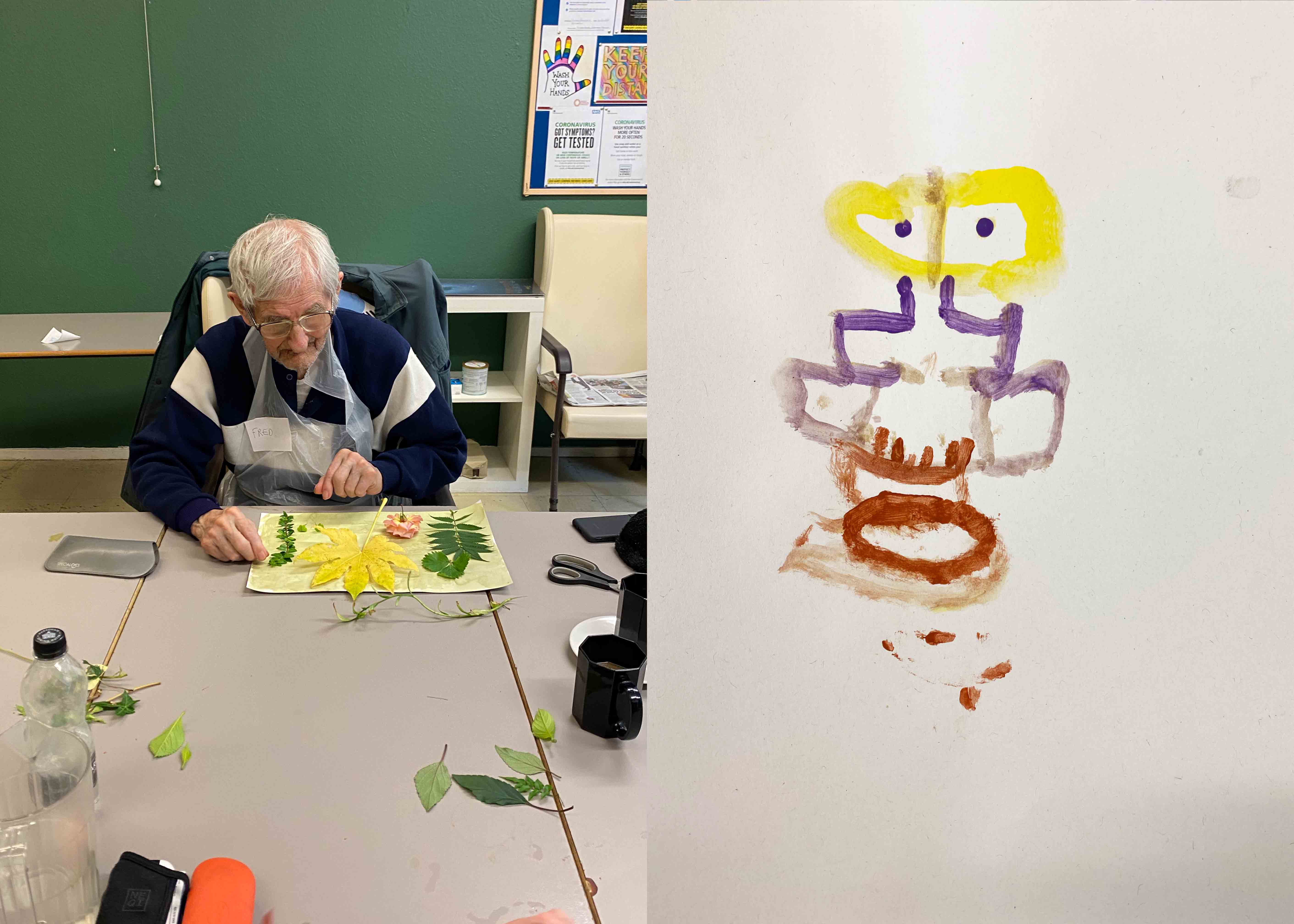 Man creating art with leaves and a drawing of a face
