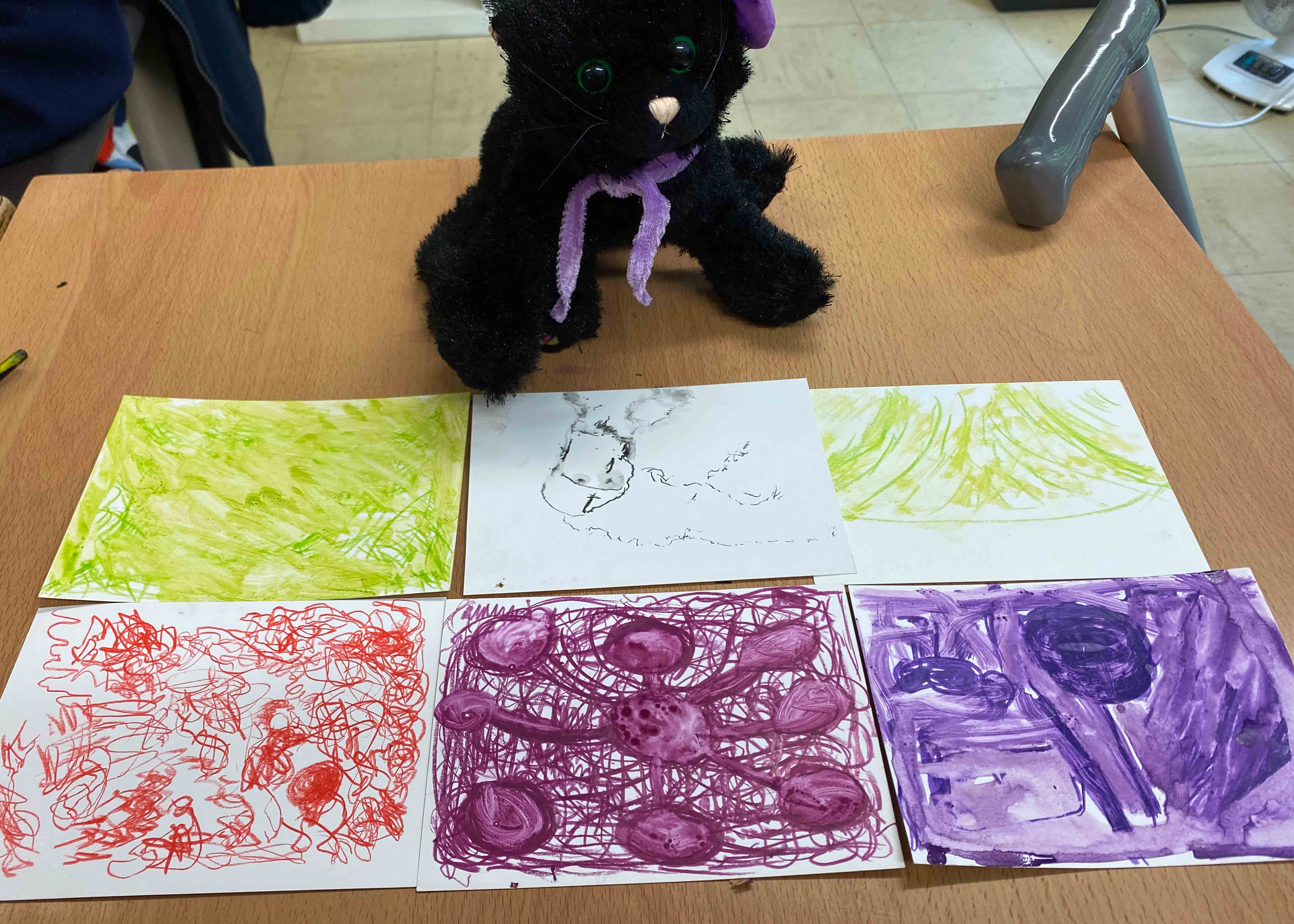 Expressive drawings and a toy cat