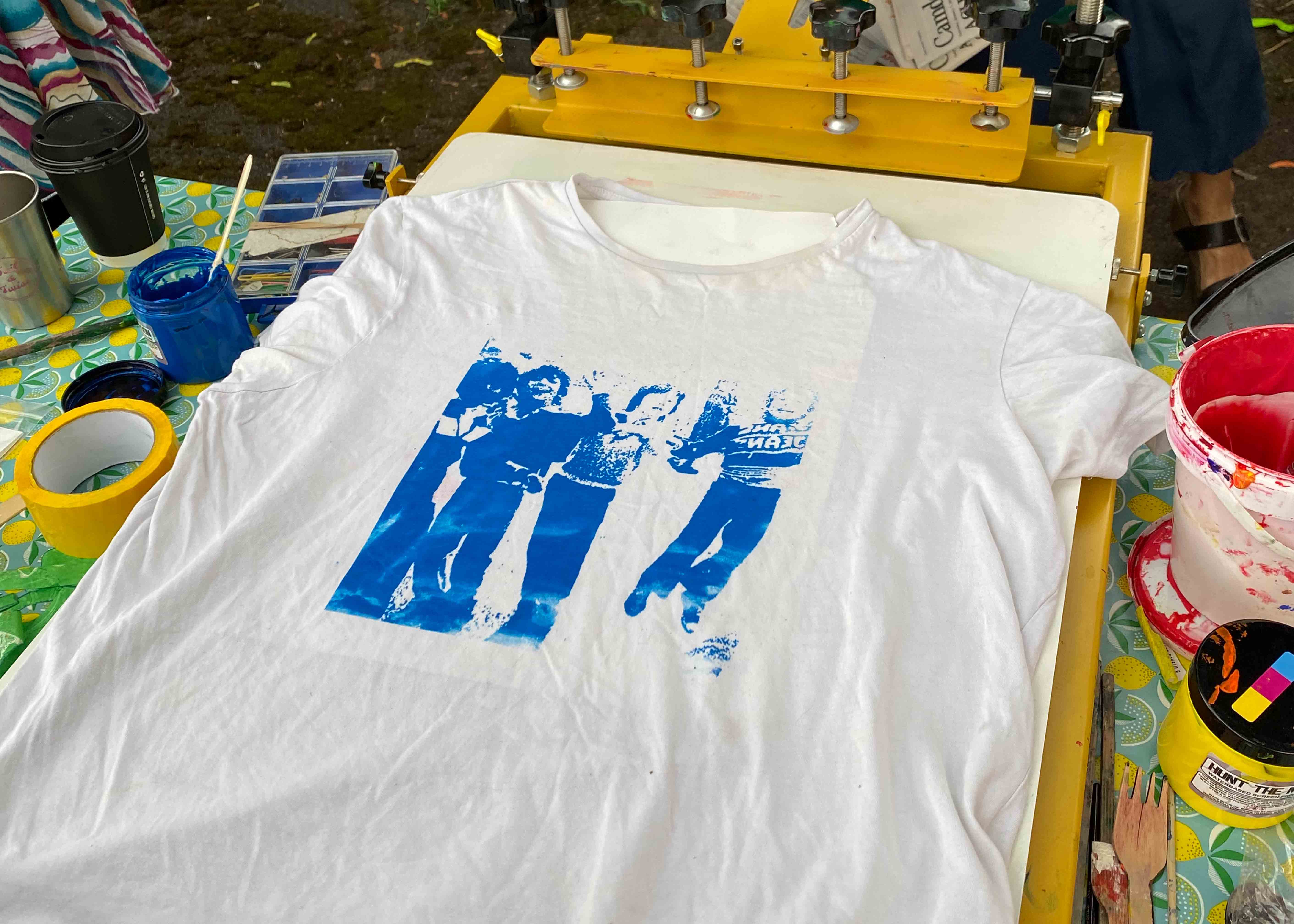 A t-shirt being screen printed