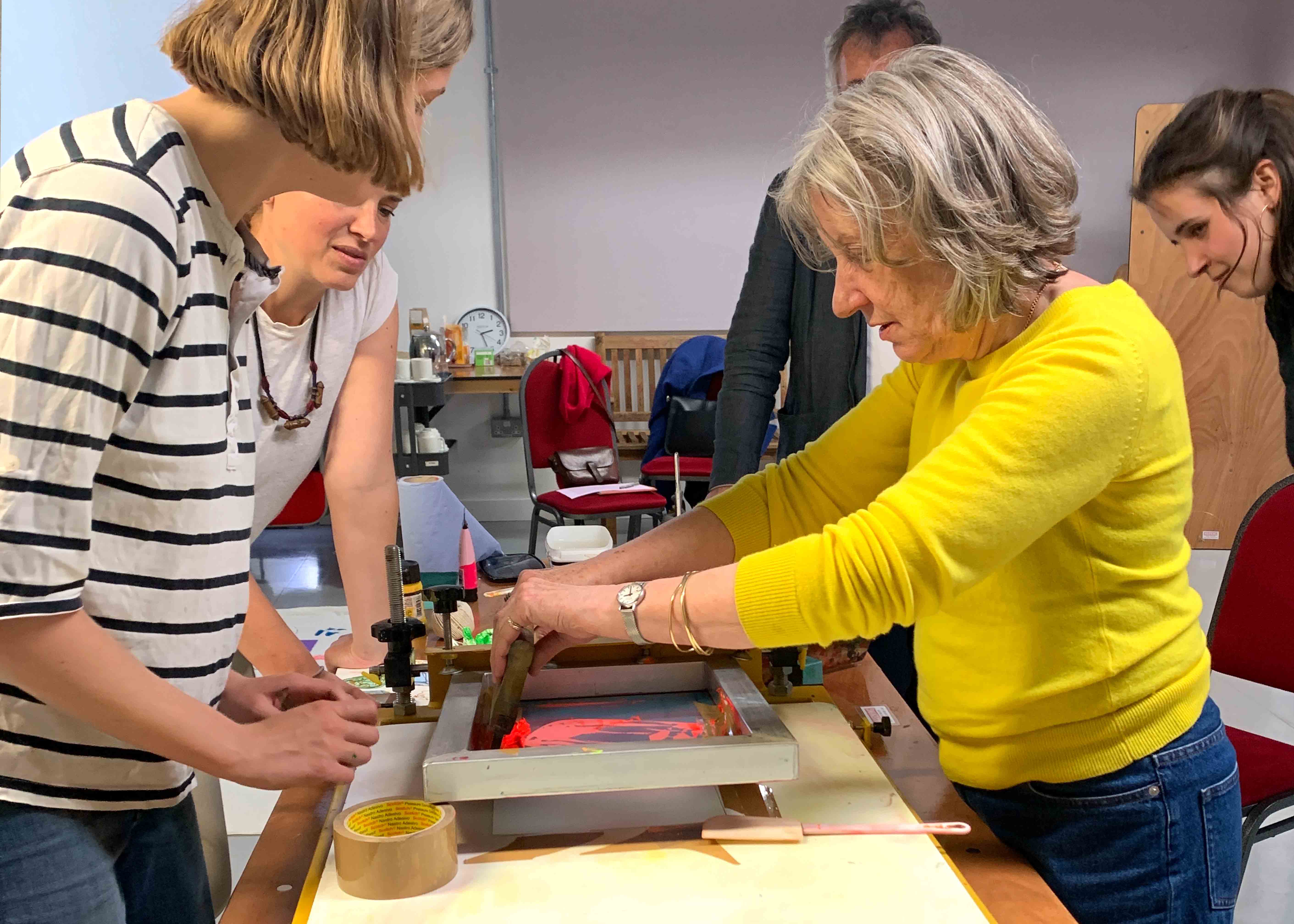 People screen printing