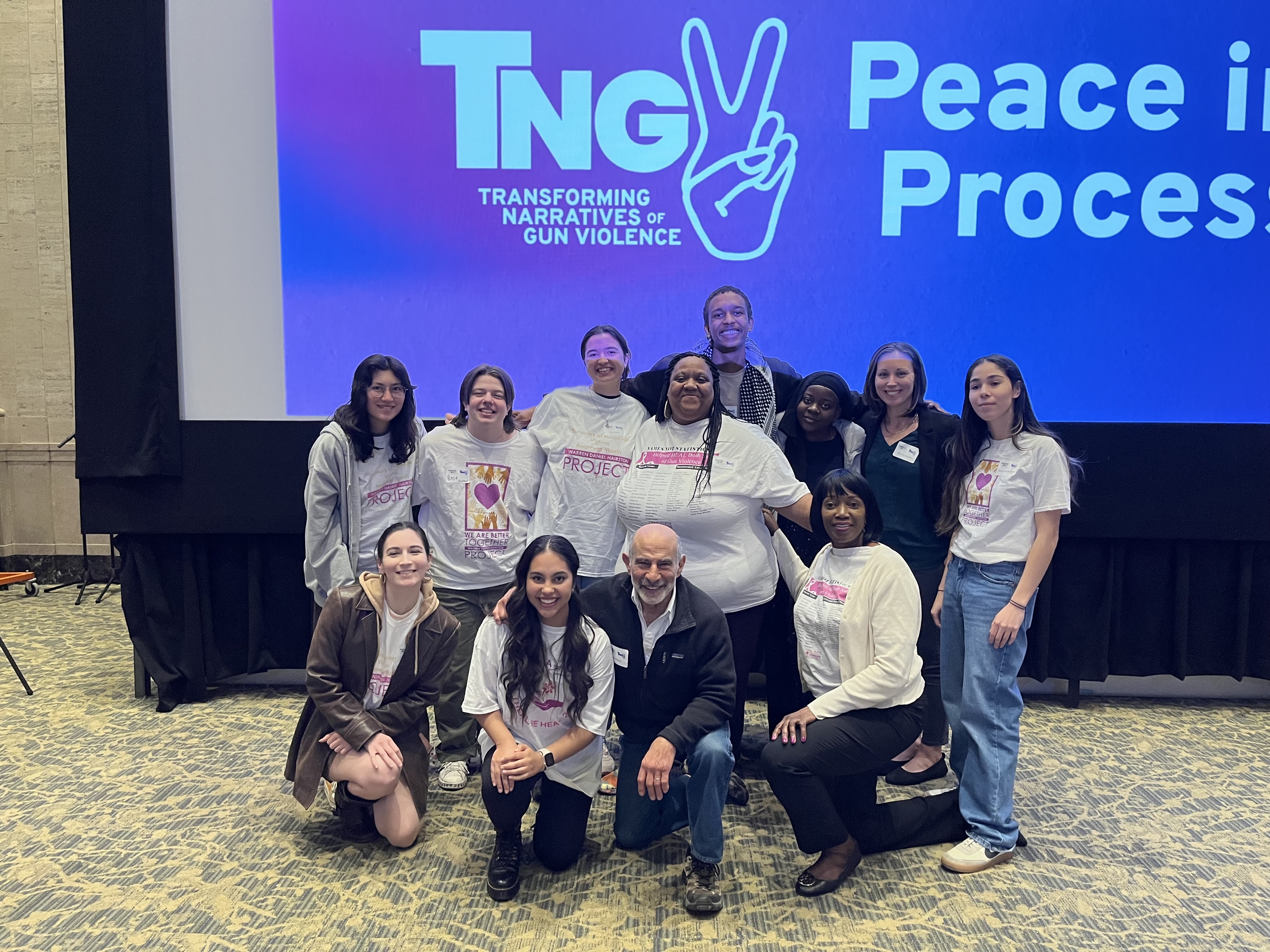 A posed group photo of studio participants.