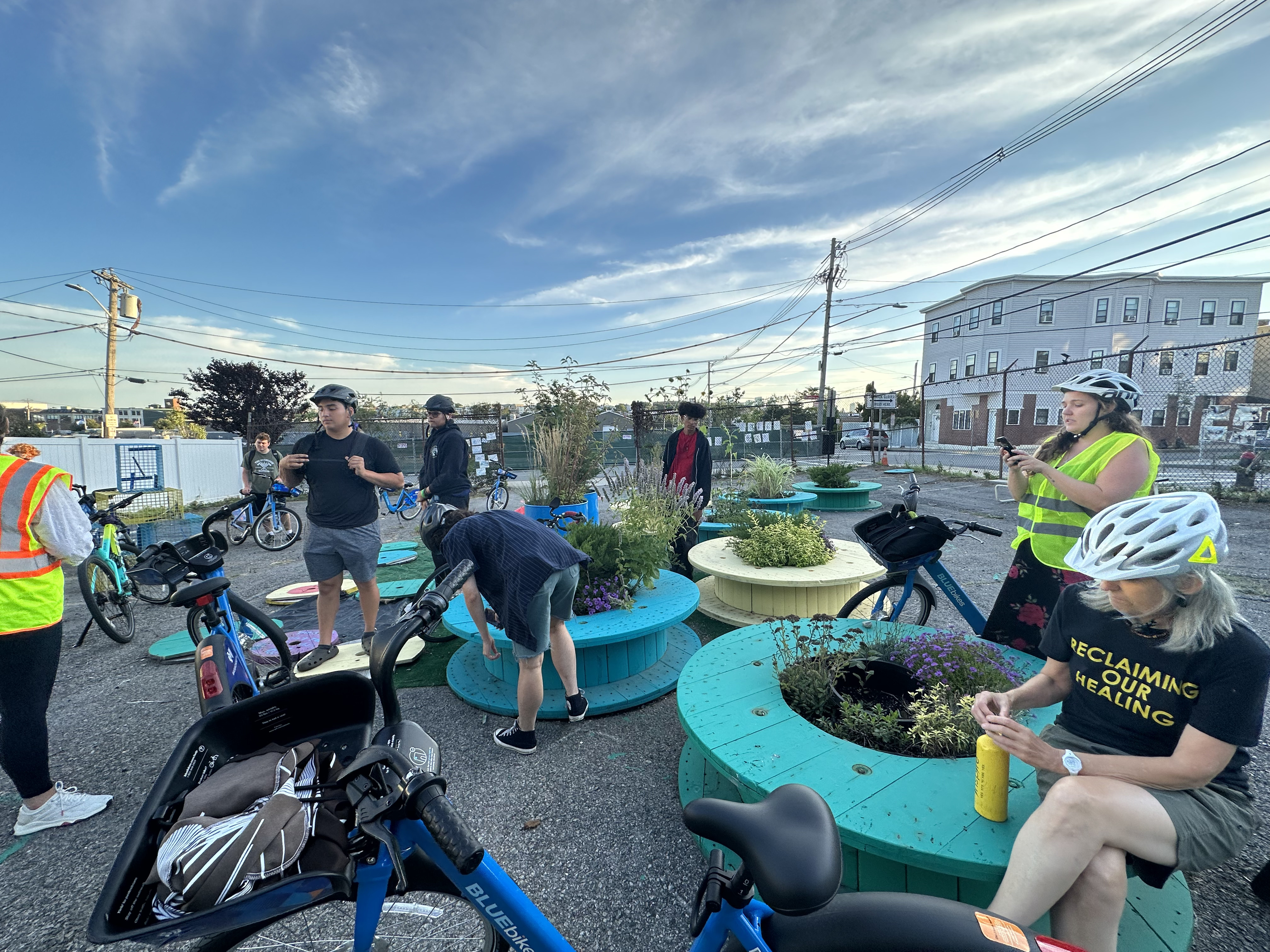 Emerson students near planters outdoors