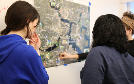 Students engaging with a map during the Teach-In on Sustainability