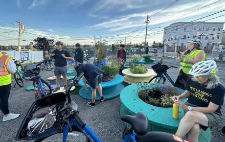 Emerson students near planters outdoors