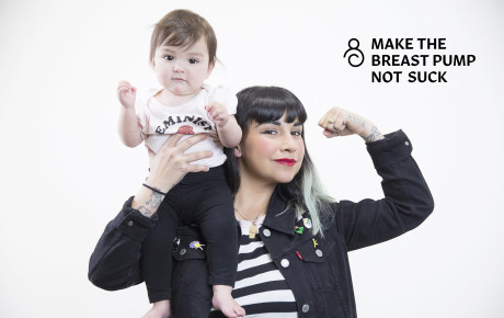 Person Holding up a baby not their shoulders.