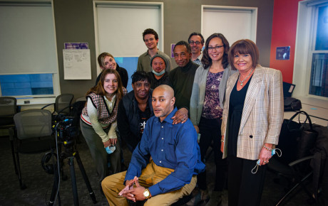 Participants gather on the last production day of the Changing Narratives of Gun Violence social impact studio. From back left: Sabrina Carr ’24, Cole Tatham ’22, Professor Eric Gordon. Middle row: Anna Porter, administrative coordinator, MGH Center for Gun Violence Prevention; Leeann Taylor, who lost her son, Daniel, to gun violence; John Yang ’21, a student who came to the Boston campus through the Emerson Prison Initiative (EPI); Senior Distinguished Director-in-Residence Theodore (Regge) Life; Engagement Lab Strategic Partnerships Manager Rachele Gardner; and Kate Haskins, coordinator, MGH Violence Intervention Advocacy Program. Seated: violence recovery advocate Rahsaan Peters.