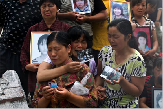 An informal gathering of parents whose children were crushed to death in shoddy schoolhouses commemorated their children at Juyuan Middile School in Dujiangyan, one of the most destroyed areas in the Sichuan earthquake, on May 27, 2008 (Jacobs 2008).