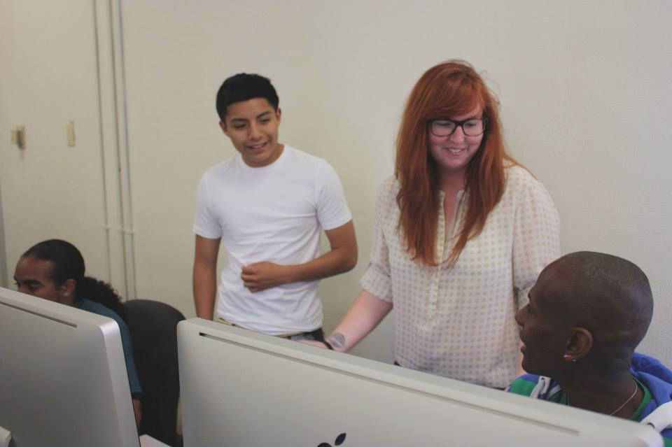Colocation America VP of Online Strategies Samantha Walters talks to student Jose Sandoval and client Robert Hubbard. | Photo: J. Morr