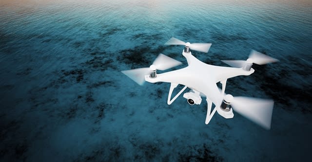 Mapping Oil Spills with Swarms of Drones