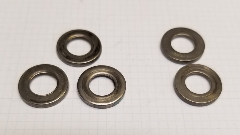 NAS1587_Washers_Crushed_in_service_and_undamage_flat_Side_2_cof9uk.jpg
