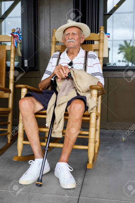 55-elderly-eighty-plus-year-old-man-sitting-on-a-rocking-chair-_gwpa90.jpg