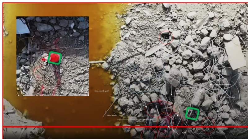 Overheads_of_debris_pile_at_end_of_ramp__zoom_with_slide_in_lower_RH_corner_owyyfa.jpg