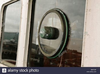 Back view of strong female athlete reflecting in mirror in gym and doing  squats with heavy barbell during workout Stock Photo - Alamy