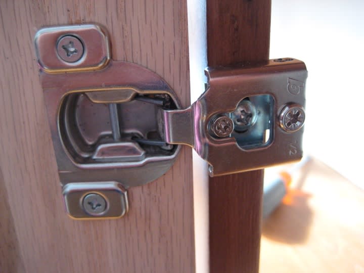 cabinet_hinge_close_up_lske9o.jpg