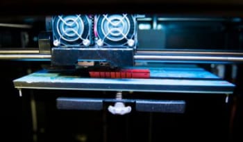 The researchers used 3D printers on board the ship to create new versions of the grippers (orange) overnight in response to feedback from the ROV pilots and biologists. (Image courtesy Wyss Institute at Harvard University.)