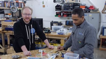 To gain some inspiration for their glue gun project, Heck and Gardner take apart what is already on the market. Why reinvent the wheel on a tight two-week schedule? Just be careful with copyrights. (Image courtesy of The Ben Heck Show.)