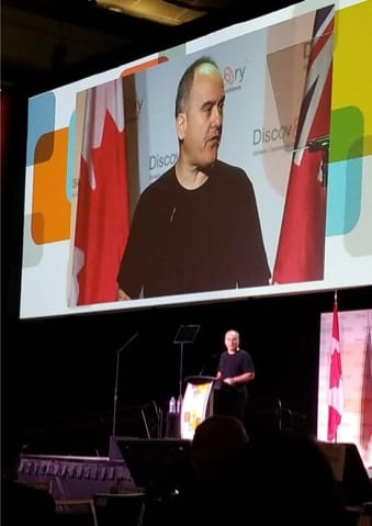 John Ruffolo giving his keynote at Discovery 2019.