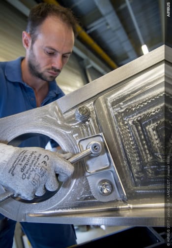 The 3D-printed titanium bracket assembly, produced by laser powder bed fusion and installed on a commercial A350 XWB aircraft. (Image courtesy of Airbus.)