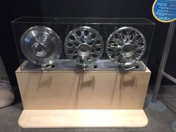 Hu's original wheel (left), an early iteration of the design (center), and the biomimetically inspired final product (right).