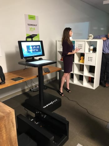 Step into my FitStation, says Sarah Clevinger, Immersive Computing Business Development for HP. HP teams up with Supefeet and RSscan to create custom insoles for now, and in the future, shoes, though perhaps not like the ones Sarah is wearing.