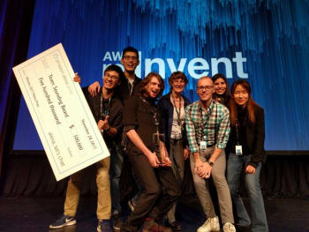 The UW Sounding Board team (left to right: Hao Fang, Hao Cheng, Ari Holtzman, Mari Ostendorf, Maarten Sap, Elizabeth Clark, Yejin Choi) wins Amazon's inaugural Alexa Prize. (Image courtesy of University of Washington.)