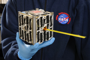 The team hopes to use asymmetrical mirrors to produce telescopes and optical equipment small enough to ride a CubeSat like this one. (Image courtesy of NASA.)