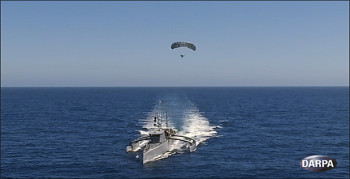 The TALONS system deployed and tethered to an ACTUV vessel. (Image courtesy of DARPA.)